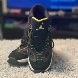 Air Jordan 11 Retro Low Black and Yellow